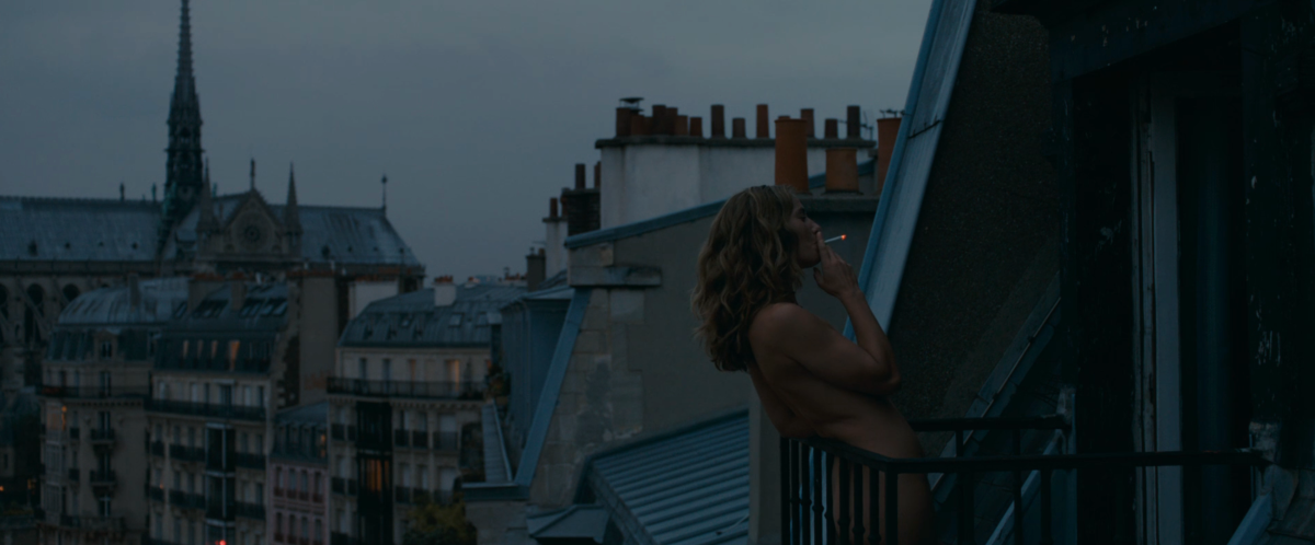 Delphine smoking a cigarette in Summertime